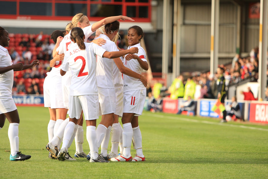 Rachel Yankey (right) is congratulated by her team-mates after opening the scoring against Turkey on the night of her 100th England cap.